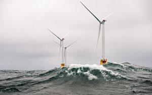 Heavy seas engulf the Block Island Wind Farm- the first US offshore wind farm. The five Halide 6MW turbines were installed by Deepwater Wind and began producing power in 2016. (Photo by Dennis Schroeder / NREL)