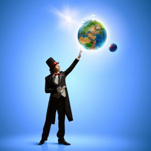 Image of magician in hat holding globe. Ecology concept. Elements of this image are furnished by NASA