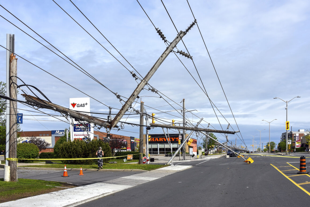 Power lines and traffic lights down on Merivale Road, a busy street in the west end of Ottawa after a severe storm passed through the area causing a lot of damage and power outages the day before.